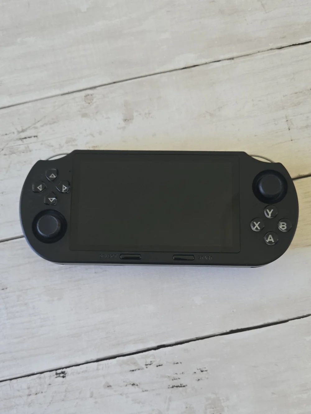 SF3000 handheld game